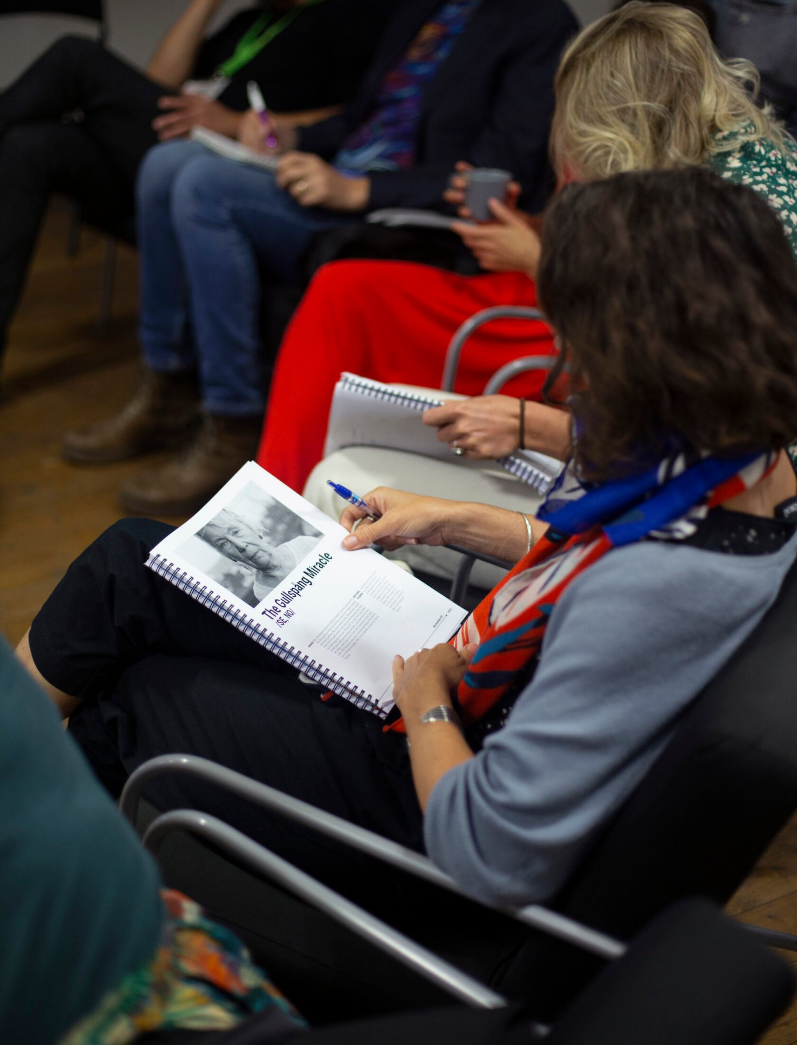 Woman reading papers